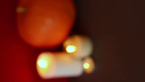 Vertical Video. lighted candles with pumpking. Halloween, blur background. Video stock 147893353