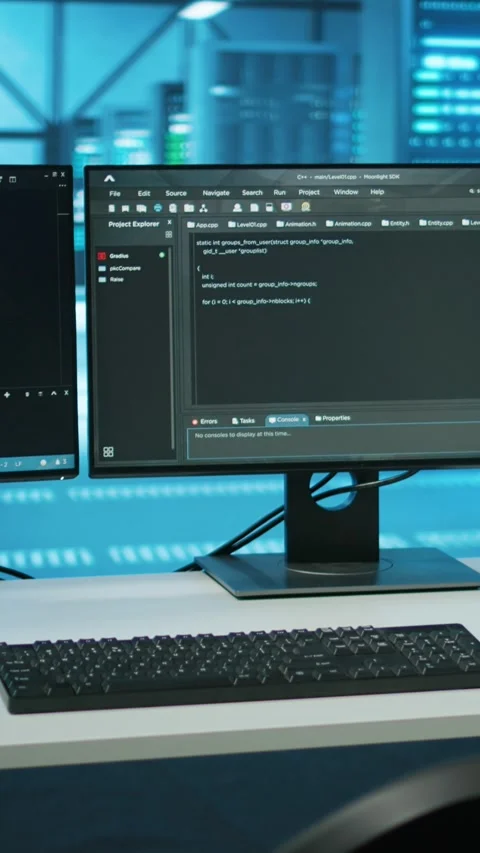 Vertical video Lines of code running on computer screens in data center Stock Footage 275992688
