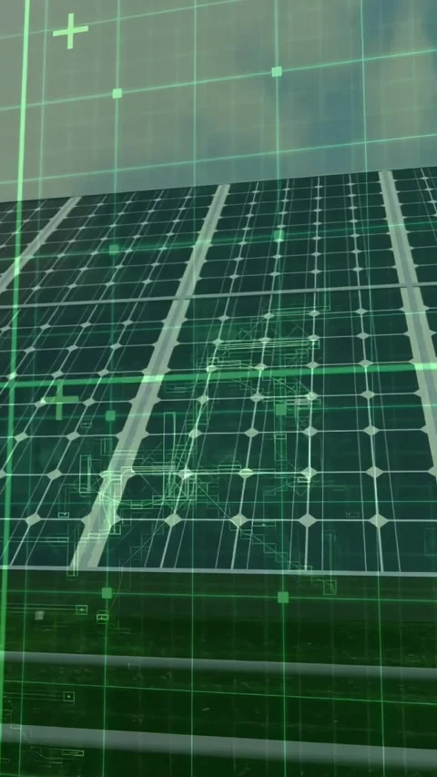 Vertical video: Low-angle camera moving across solar array, causing green HUD Stock Footage 334550338