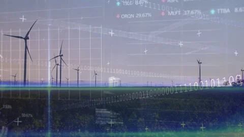 Vertical video: Low sun causing wind turbines rotating as overlays displaying Stock Footage 332666873