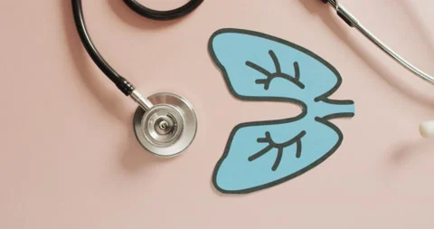 Vertical video of lungs icon and stethoscope on beige background Stock Footage 207056699