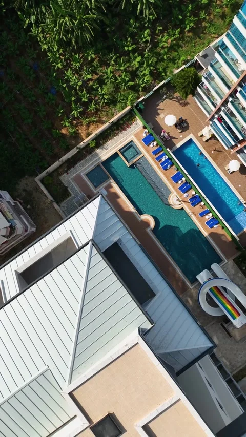 Vertical Video: Luxurious Pool with Azure Water in a Stylish New Residential Video stock 297720665
