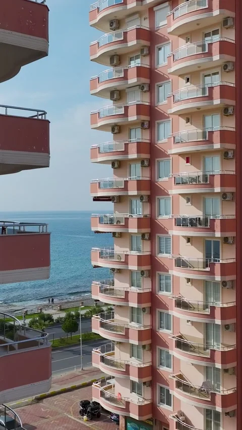 Vertical video luxury apartment complex exterior with pool area Stock Footage 341894531