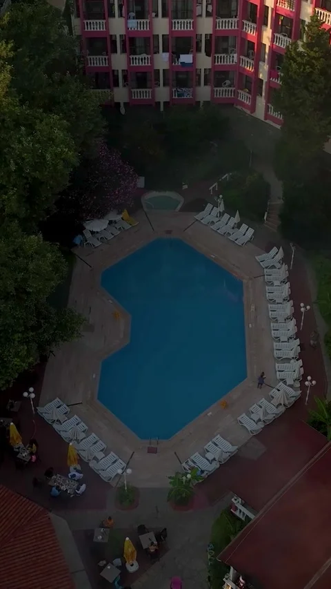 Vertical Video: Luxury Hotel Complex with Modern Buildings, Green Landscaping Stock Footage 297718829