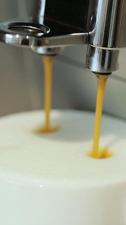 Vertical video. Making cappuccino using automatic coffee machine. Stock Footage 345702983