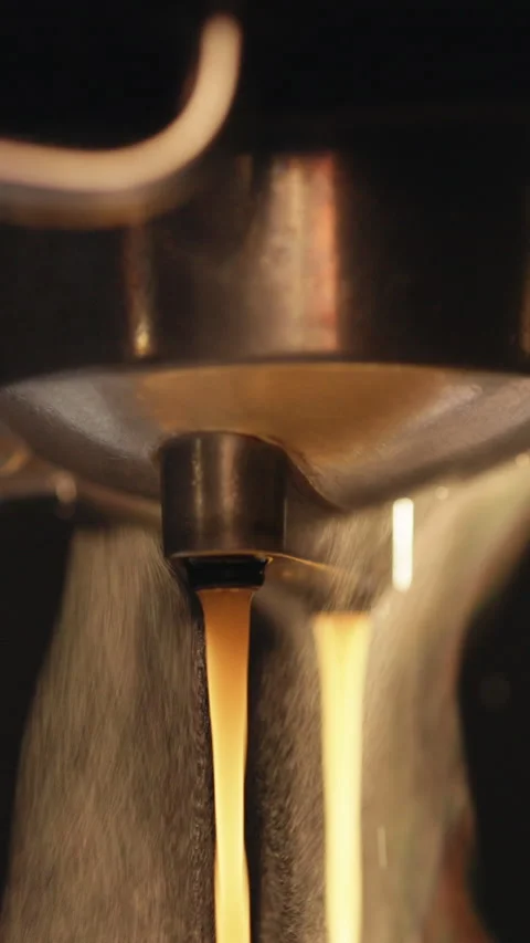 Vertical Video of Making of strong coffee in coffee machine, the back light Stock Footage 305233402