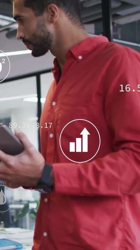Vertical video: Male analyst tapping tablet in tech office, monitoring charts Stock Footage 334382039