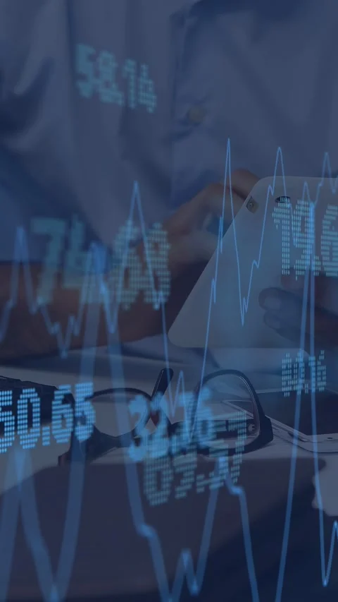 Vertical video: Male analyst tapping tablet while market data and charts Stock Footage 335355404