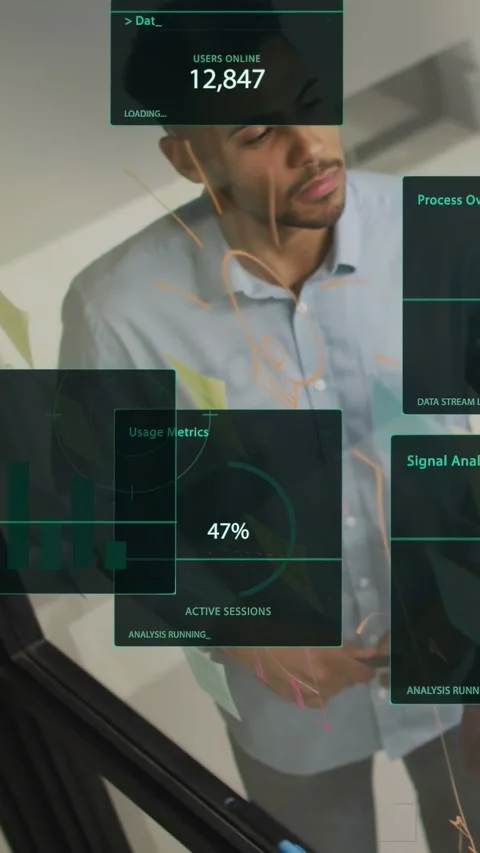 Vertical video: Male analyst watching tech panels appearing on glass, leaning to Stock Footage 333744451