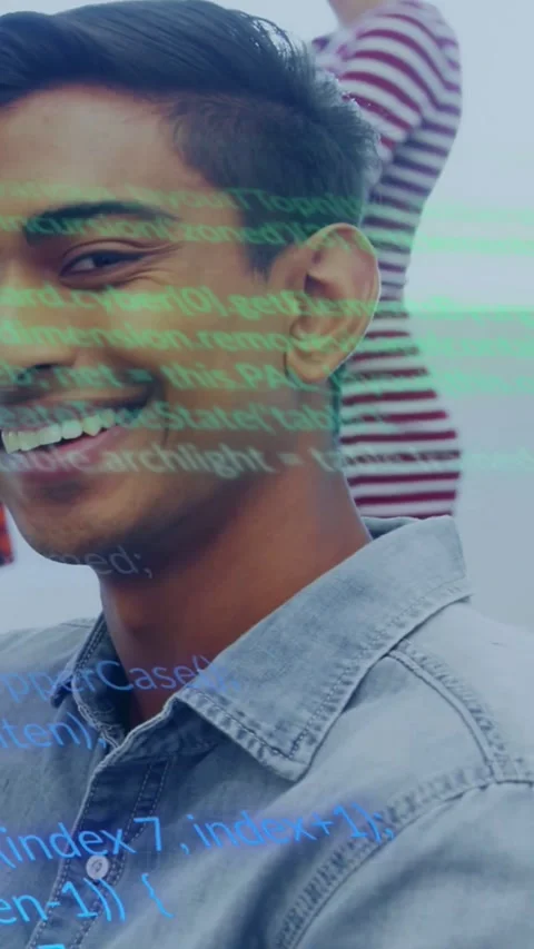 Vertical video: Male dev smiling and turning while code revealing coworker in Stock Footage 334187478