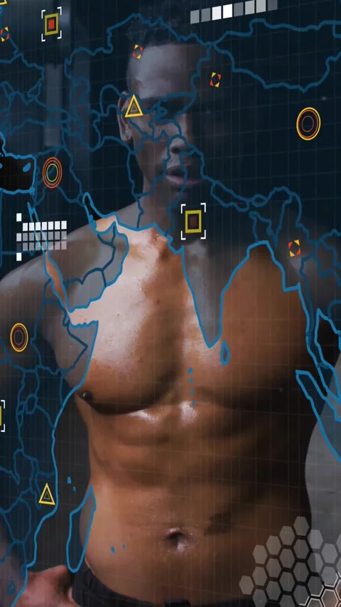 Vertical video: Male model standing in dim tech lab as HUD booting, scanning Stock Footage 330965103