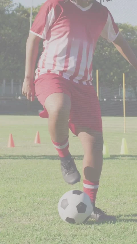 Vertical video: Male player starting training by touching ball, performing close Stock Footage 334296832