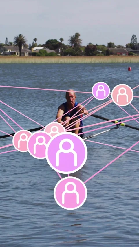 Vertical video: Male rower rowing and placing blades, causing pink overlay Stock Footage 330580934