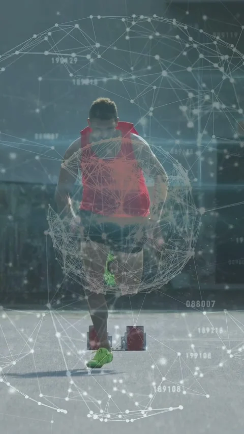 Vertical video: Male sprinter pushing from blocks to camera sphere pulsing Stock Footage 337540575