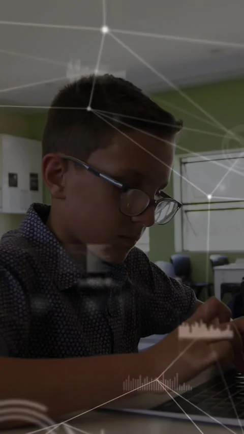 Vertical video: Male student typing on laptop causing ghosted network overlay Stock Footage 331238292