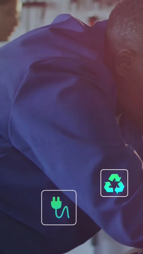 Vertical video: Male tech leaning over lab bench plug and recycle icons Stock Footage 334546954