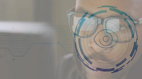 Vertical video: Male tech pro focusing on screen and activating HUD over right Stock Footage 331832784