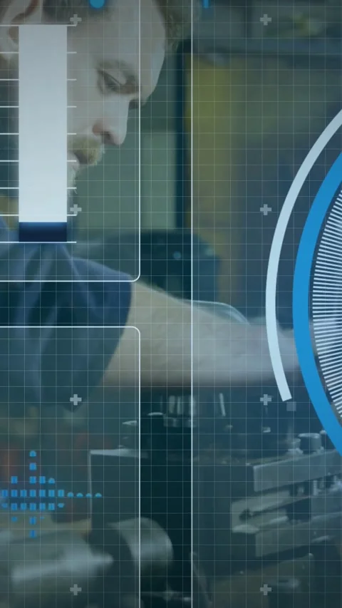 Vertical video: Male tech reaching into lathe, tuning knobs, checking rotor Stock Footage 331215823