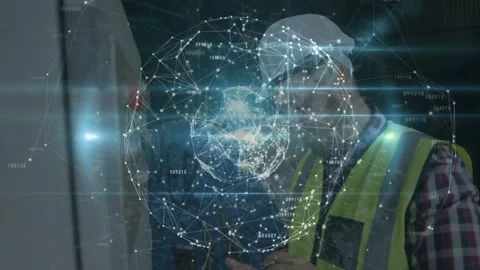 Vertical video: Male tech touching panel, holo rotating, nodes pulsing, using Stock Footage 332505059
