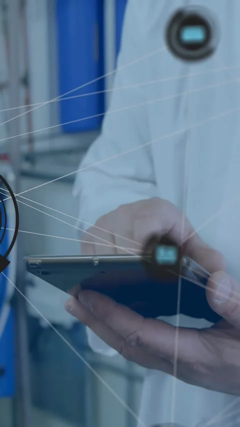 Vertical video: Male tech using phone tapping and initiating network HUD Stock Footage 332506862