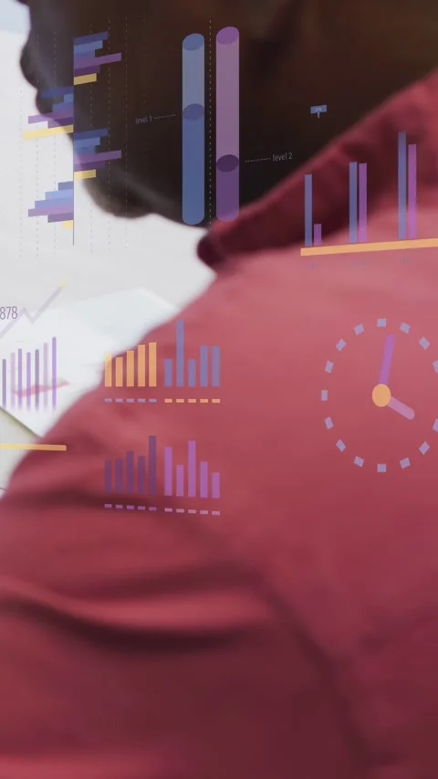 Vertical video: Male worker leaning, viewing screen and activating motion charts Stock Footage 333745029