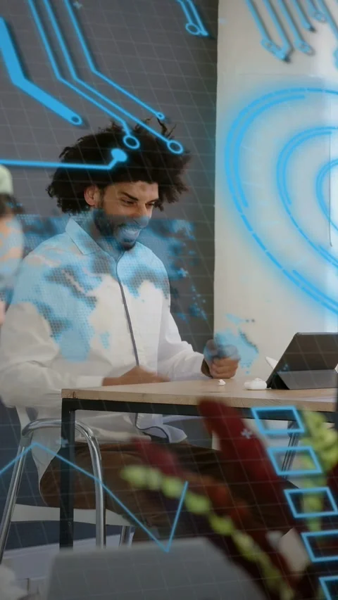 Vertical video: Man adjusting earbud tapping desk button and revealing tech AR Stock Footage 333603701