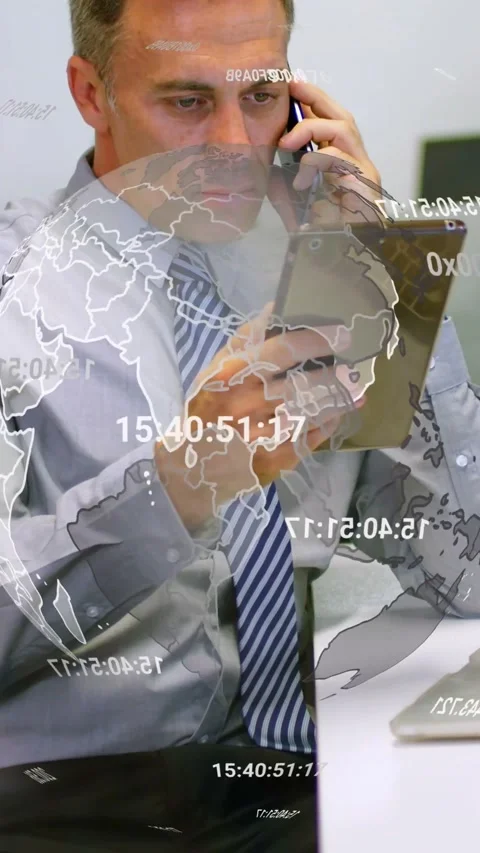 Vertical video: Man answering call while checking tablet for finance live data Stock Footage 331129062