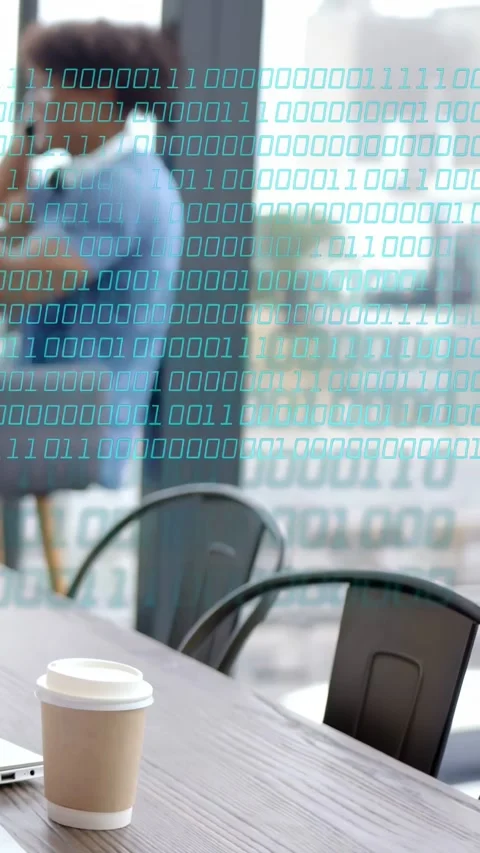 Vertical video: Man answering work call, binary tech overlay spreading across Stock Footage 335514001