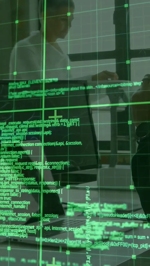Vertical video: Man arriving, pointing, woman typing on laptop under green code Stock Footage 331274369