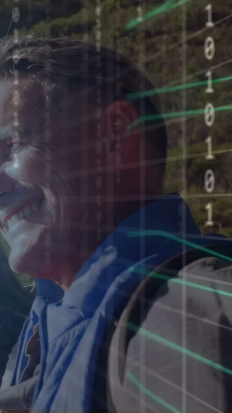Vertical video: Man blue vest smiling camera focus starting focus box and binary Stock Footage 333487284