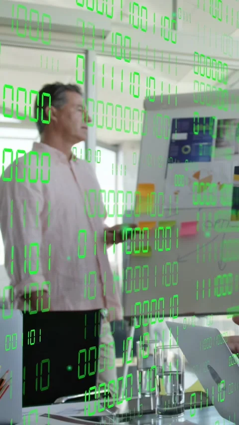 Vertical video: Man by board reacting to peer pointing, aligning under 01 Stock Footage 333577260