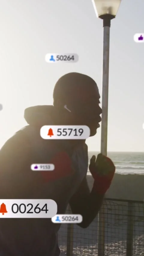 Vertical video: Man boxing seaside walk, stepping right, causing fitness Stock Footage 331790446