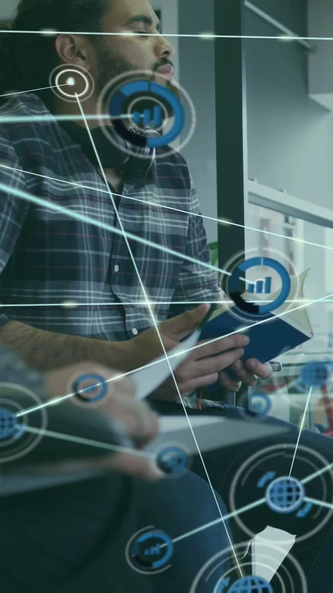 Vertical video: Man with bun flipping pages as node appearing growing network in Stock Footage 333006344
