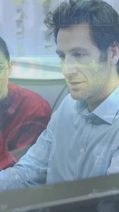 Vertical video: Man checking smartwatch then typing, code overlay showing screen Stock Footage 330580541