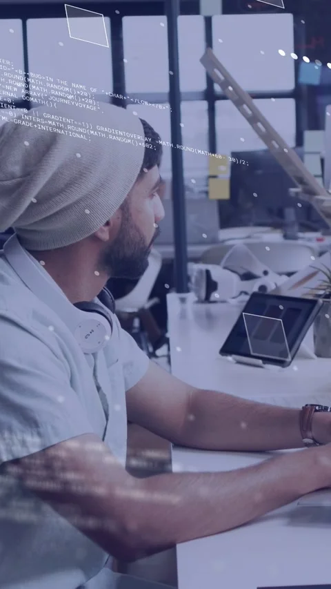 Vertical video: Man at desk turning to peer showing behind glass, code on tablet Stock Footage 334792640