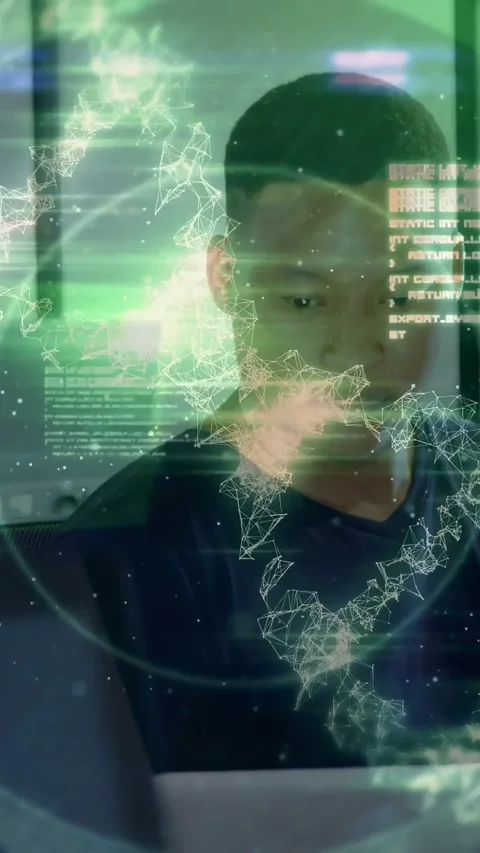 Vertical video: Man at desk typing laptop, making green DNA ring, code HUD Stock Footage 331271302