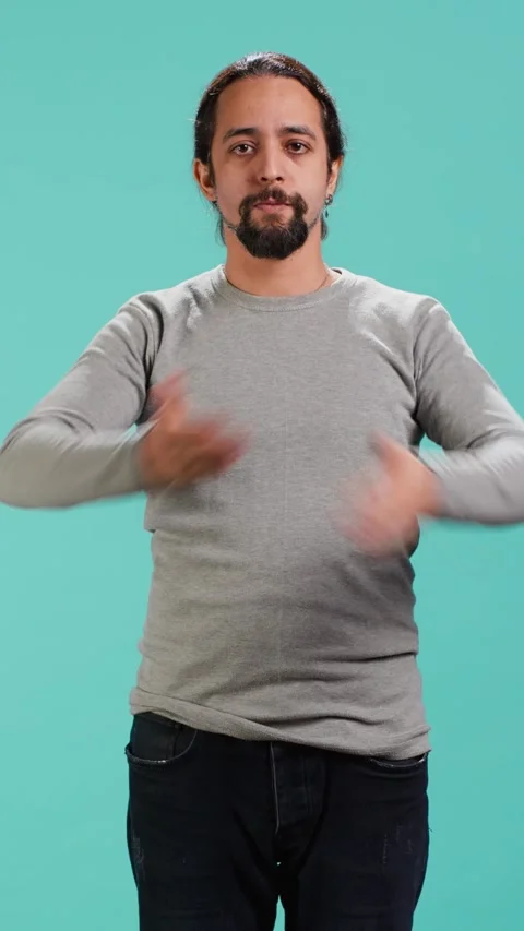 Vertical video Man doing dont see, dont hear and don speak hand gesturing Stock Footage 314514656
