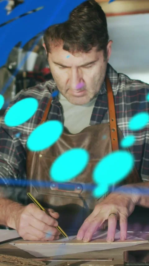 Vertical video: Man drawing lines with pencil or ruler for pattern blue HUD Video stock 331178235