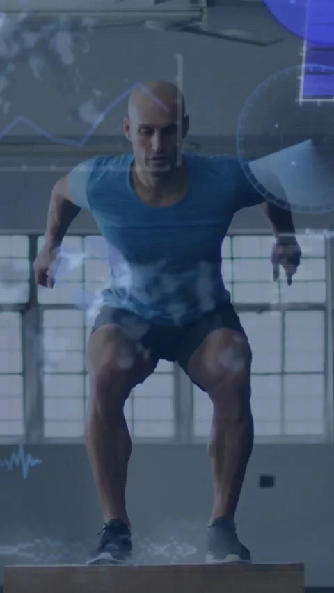Vertical video: Man driving arms, jumping onto box, landing as fitness charts Video stock 330580739