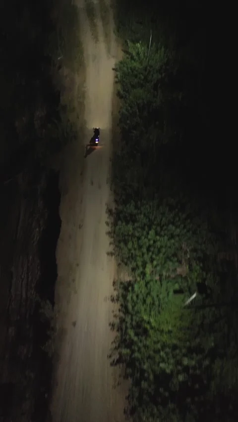 Vertical video of man driving a motorcycle Stock Footage 296103637