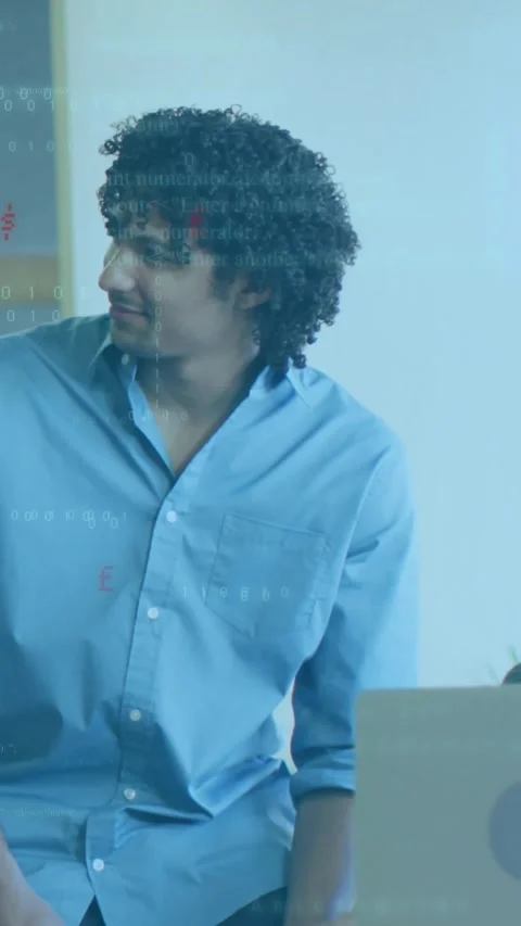 Vertical video: Man entering from left, leaning on table, turning right, Stock Footage 334397904