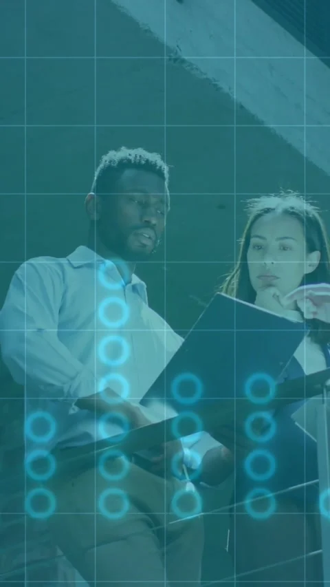 Vertical video: Man flipping file and starting tech review, woman pointing, blue Stock Footage 329913180