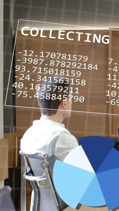Vertical video: Man following onscreen data appearing, blue charts sliding over Stock Footage 337538967