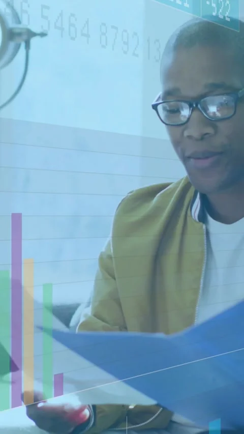 Vertical video: Man with glasses receiving sheet and steering data review with Stock Footage 331167100