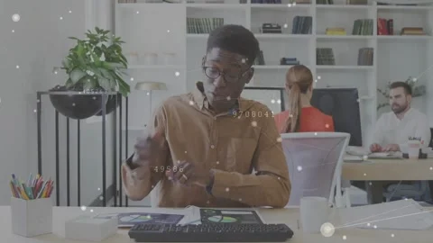 Vertical video: Man grabbing reports explaining business chart while data nodes Stock Footage 331005670