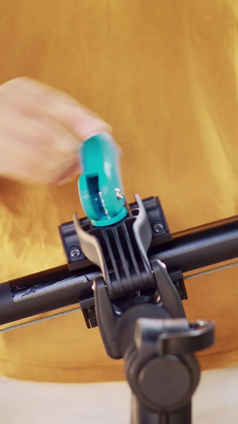 Vertical video Man grasping damaged bicycle in yard Stock Footage 247495922