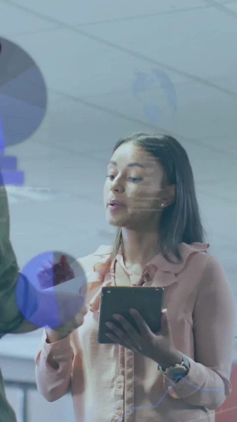 Vertical video: Man handing doc woman aligning tablet in tech explaining data Stock Footage 334598829