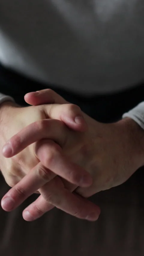 Vertical video Man hands fidget and pray, signaling depression and the losses. Stock Footage 337649441