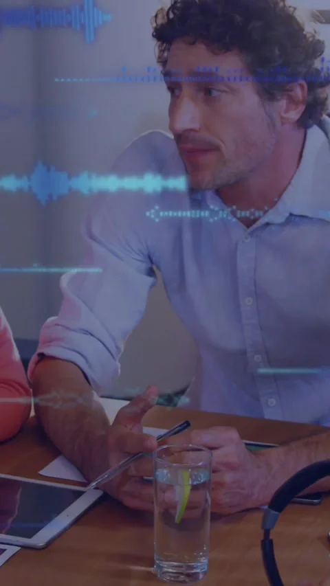 Vertical video: Man hearing question, talking, gesturing in work meeting with Stock Footage 329552346