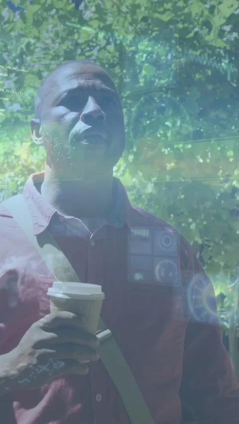 Vertical video: Man holding coffee cup on walkway, sunlight causing tech HUD, Stock Footage 333555958
